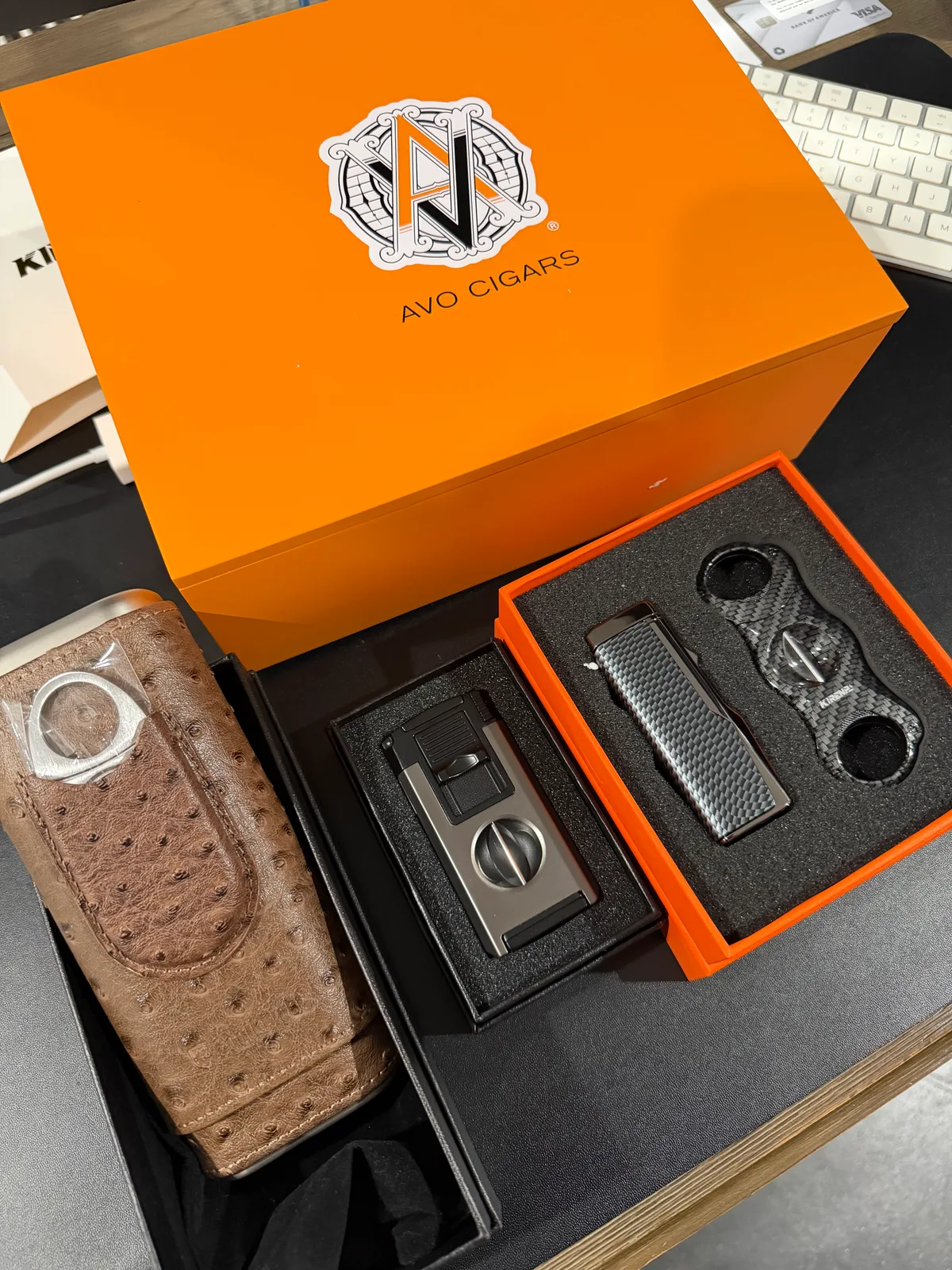 A cigar presentation box with cigar accessories